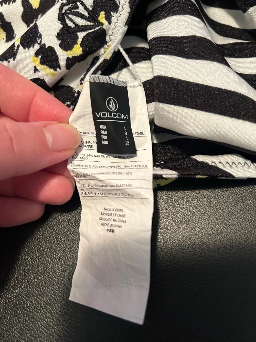 Volcom black and white striped one piece swimsuit reversible leopard large